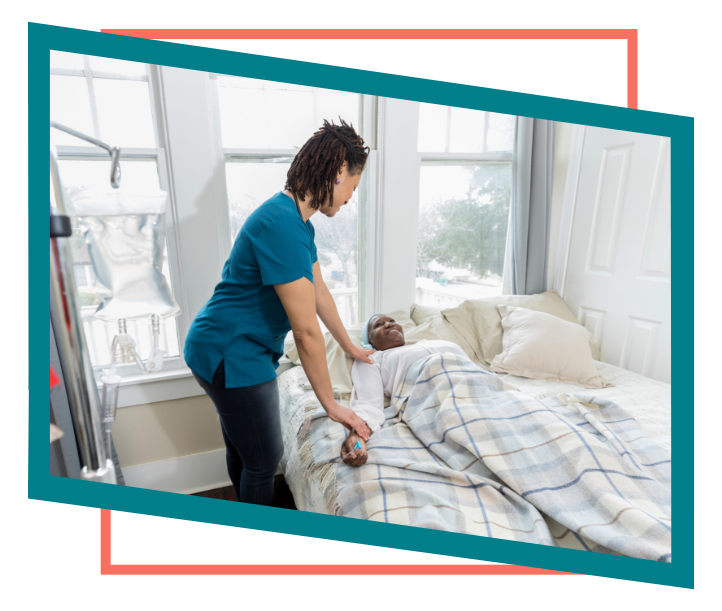 Female hospice nurse checking on a female patient