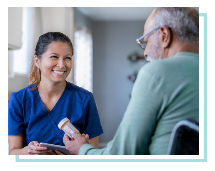 Male patient going over medications with his physician