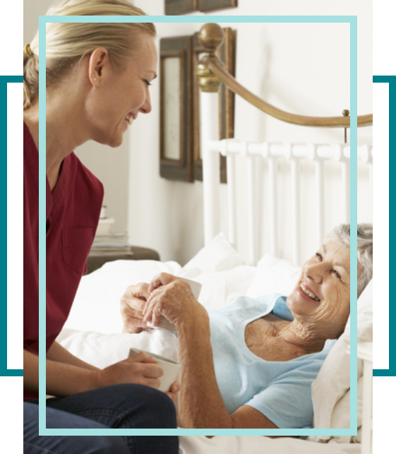 Daughter talking with her elderly mother in hospice care