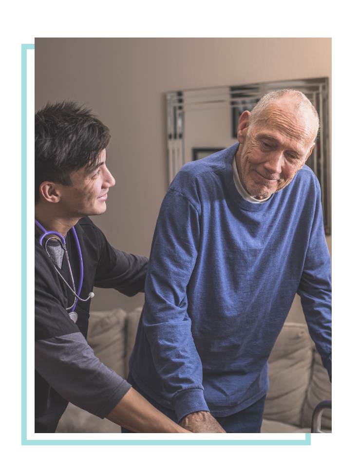 Elderly man doing physical therapy with male physical therapist