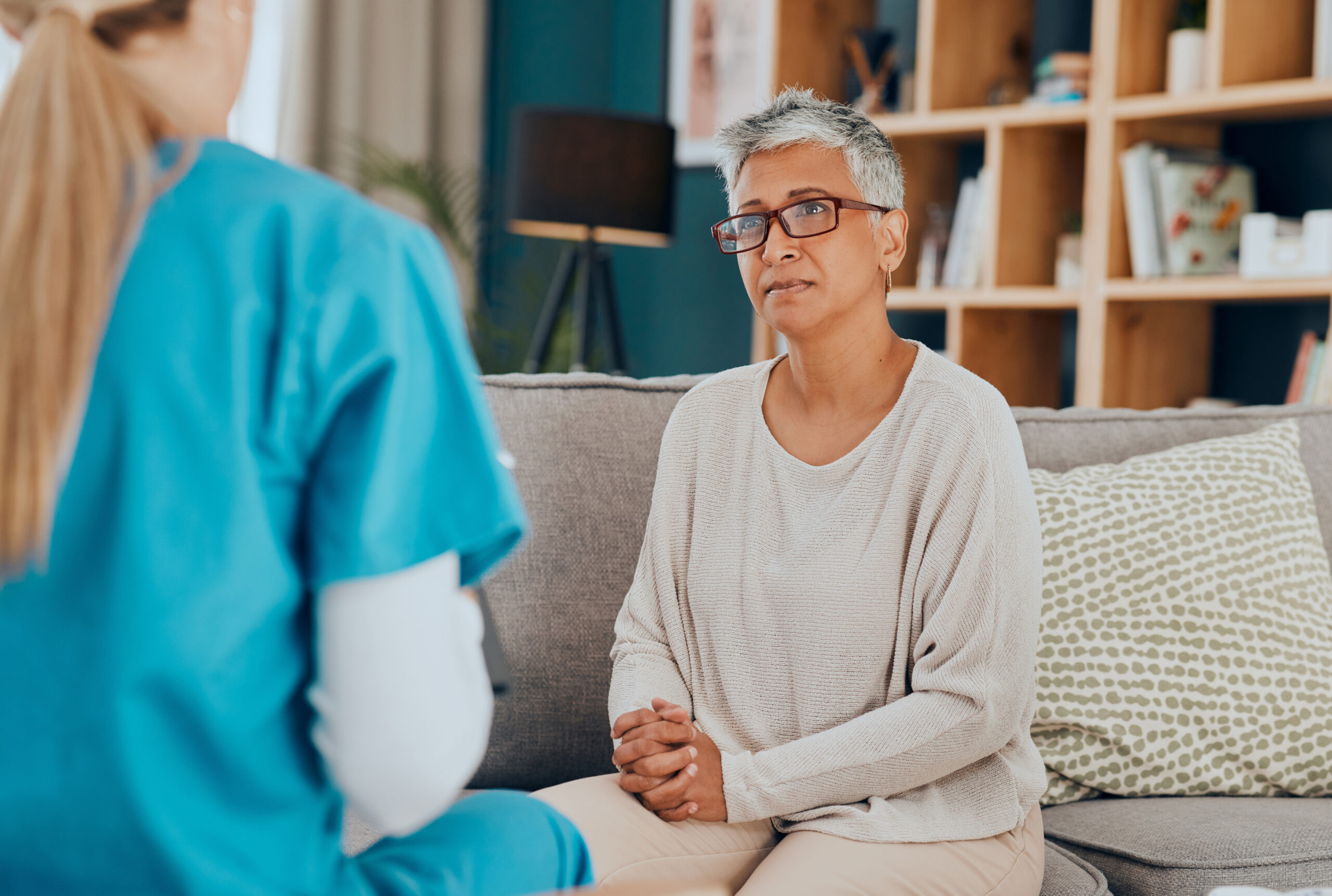 Nurse explains to senior woman which type of care is right for her